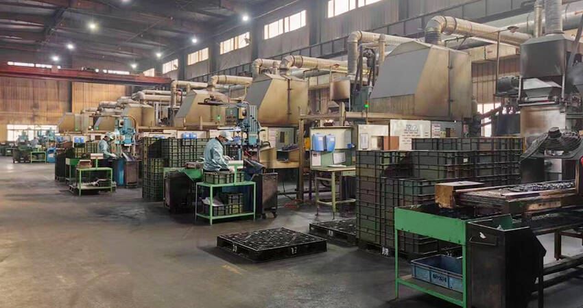 How to Reduce Porosity in Aluminum Alloy Die Casting? 3 Multiple die-casting machines operate in the factory, manufacturing automotive components.